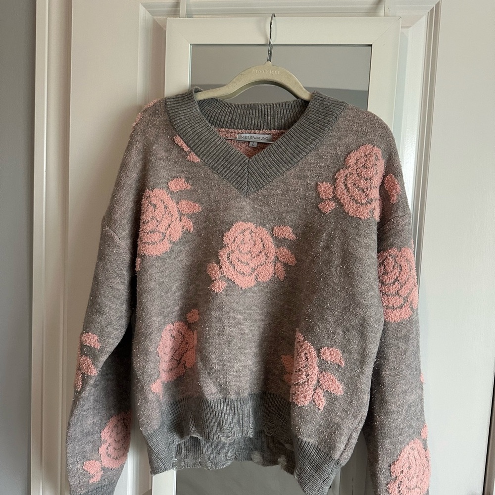 Gray and Pink V-Neck Sweater with Floral Design